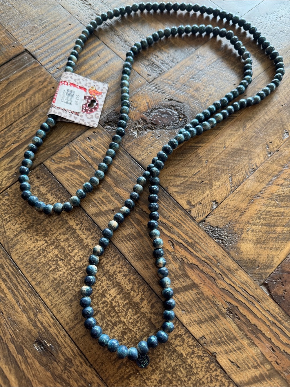 A Rare Bird Wood Beaded Wrap Necklaces